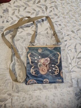 Blue Butterfly Crossbody Bag with Floral Gear Accent
